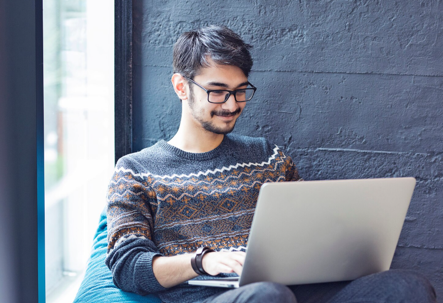 student working on laptop